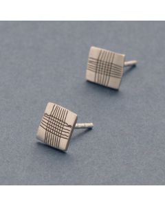 Kleine Ohrstecker Teppich