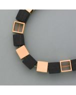 Kette mit Würfeln aus Ebenholz und Bronze